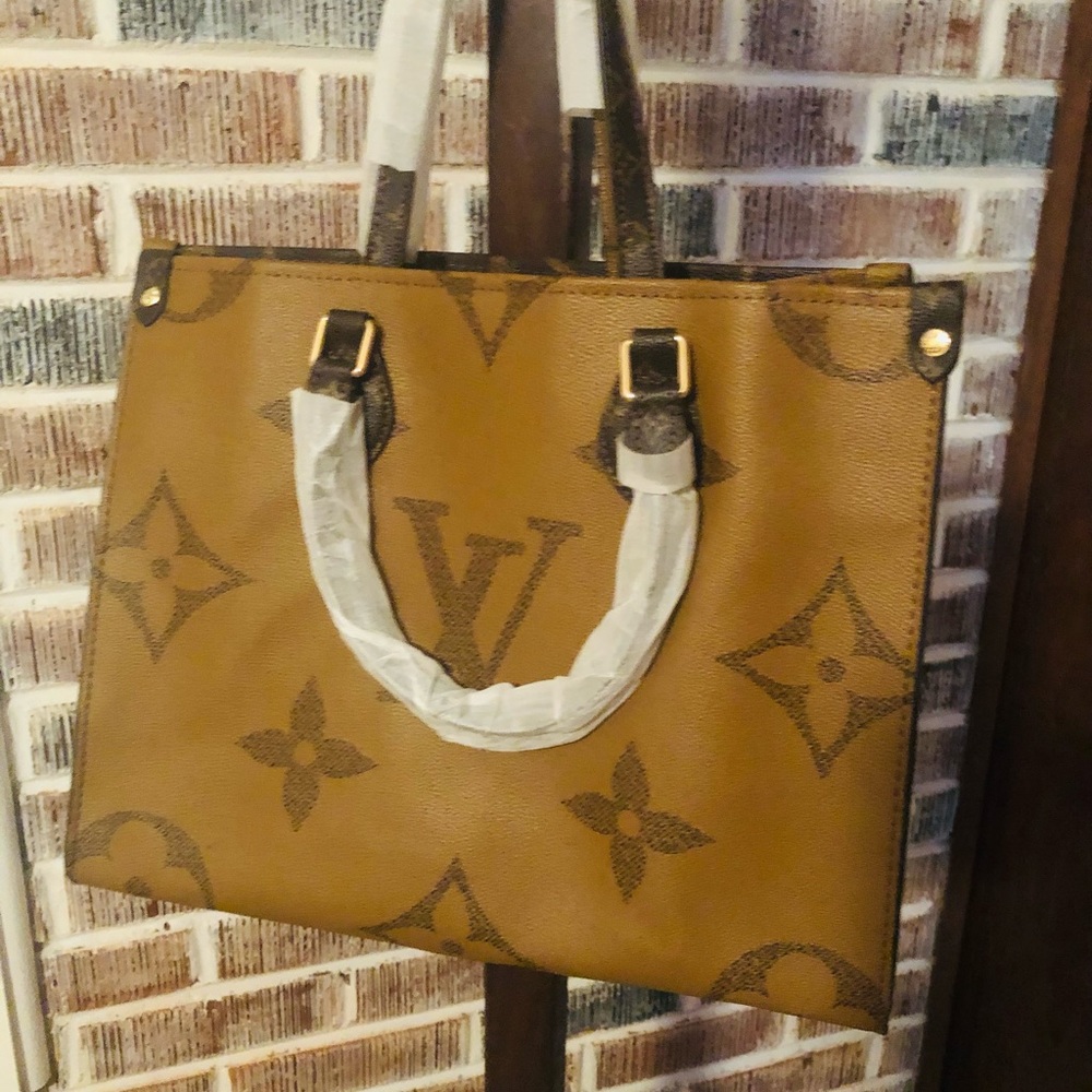 Designer Inspired med size handbag.